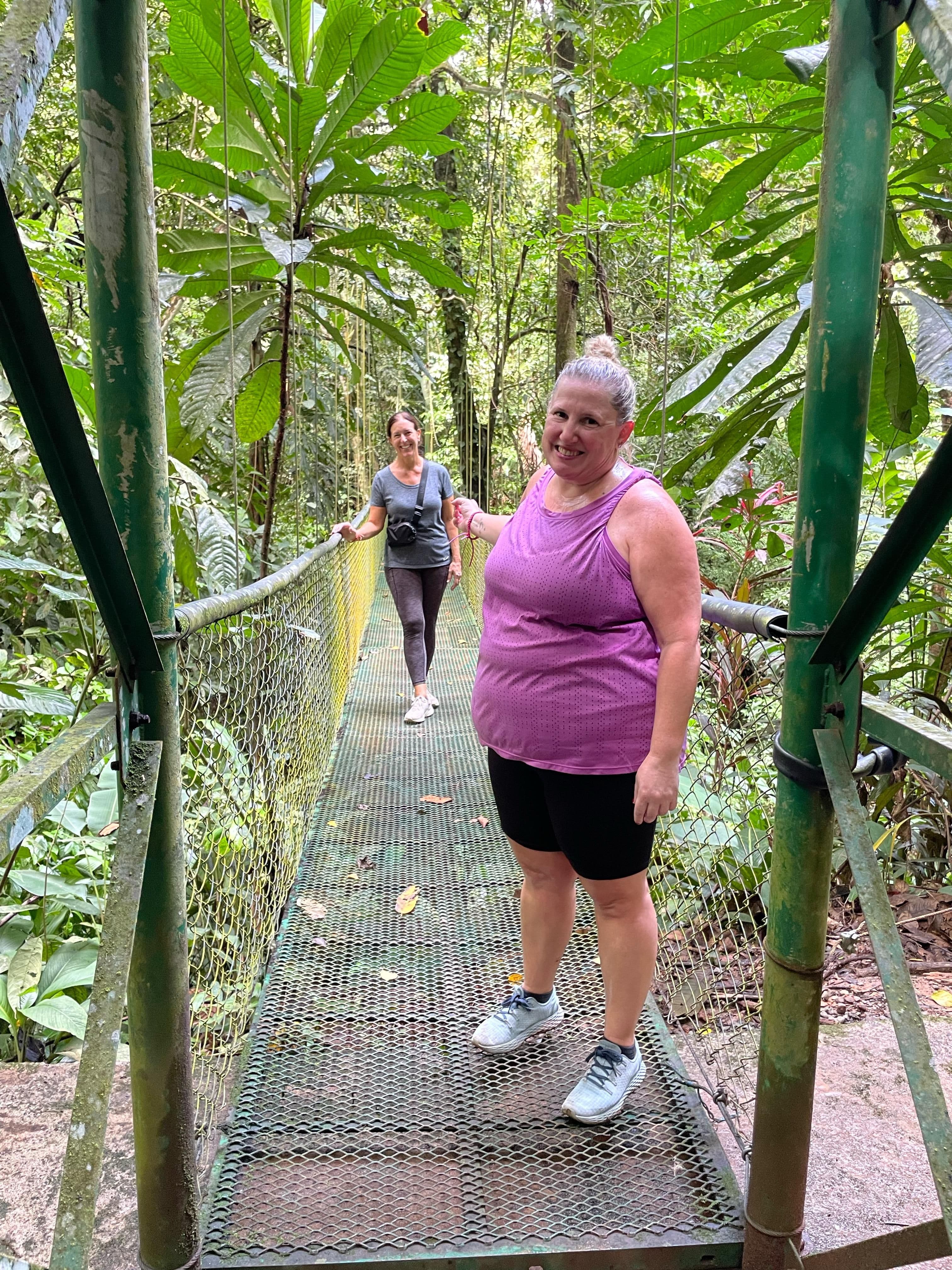Hanging bridge through dense Costa Rica jungle